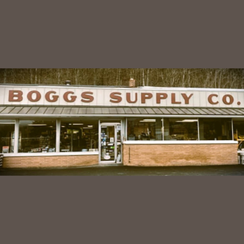 Front view of Boggs Supply Co., an old-fashioned store with large windows and a sign above. The ambiance feels nostalgic and welcoming.